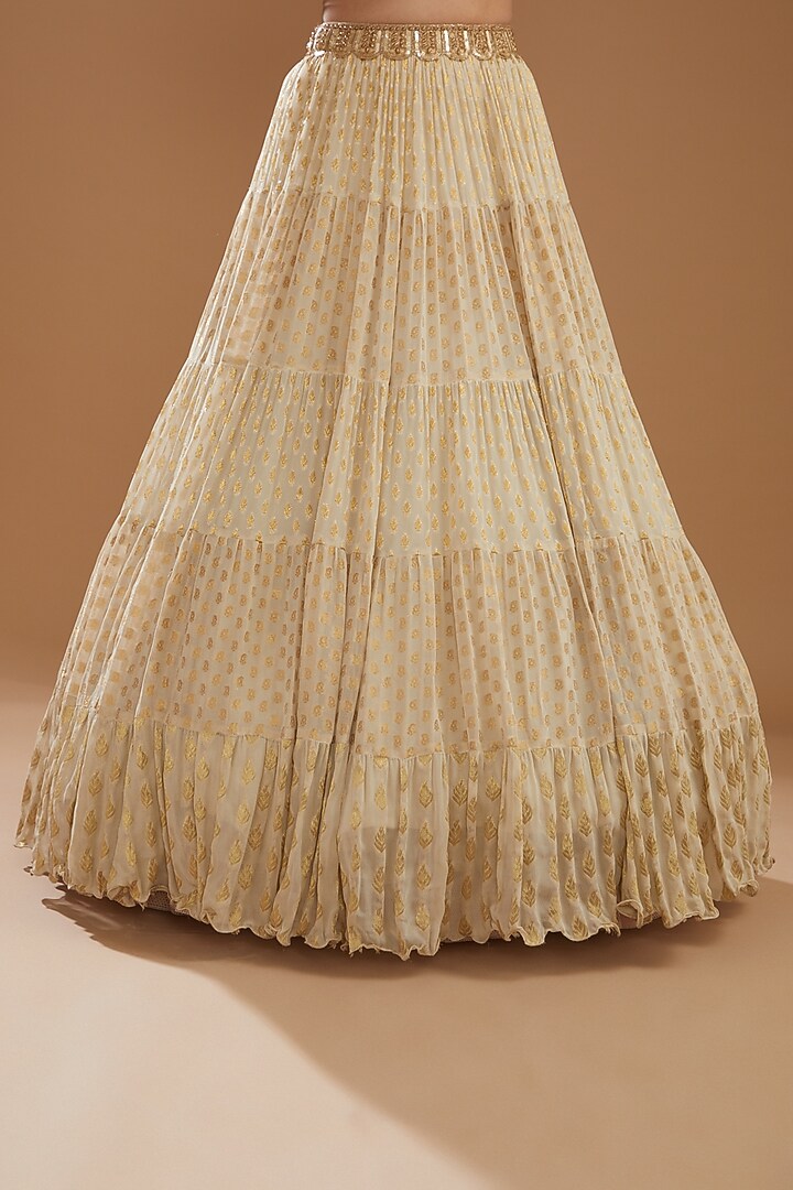 Beige Banarasi Tiered Wedding Lehenga Set by NITIKA GUJRAL at Pernia's Pop Up Shop