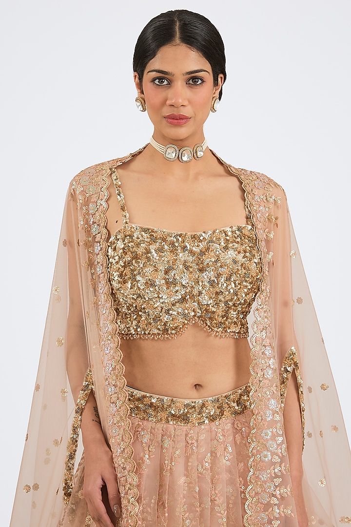 Peach Net Embroidered Jacket Wedding Lehenga Set by NITIKA GUJRAL at Pernia's Pop Up Shop