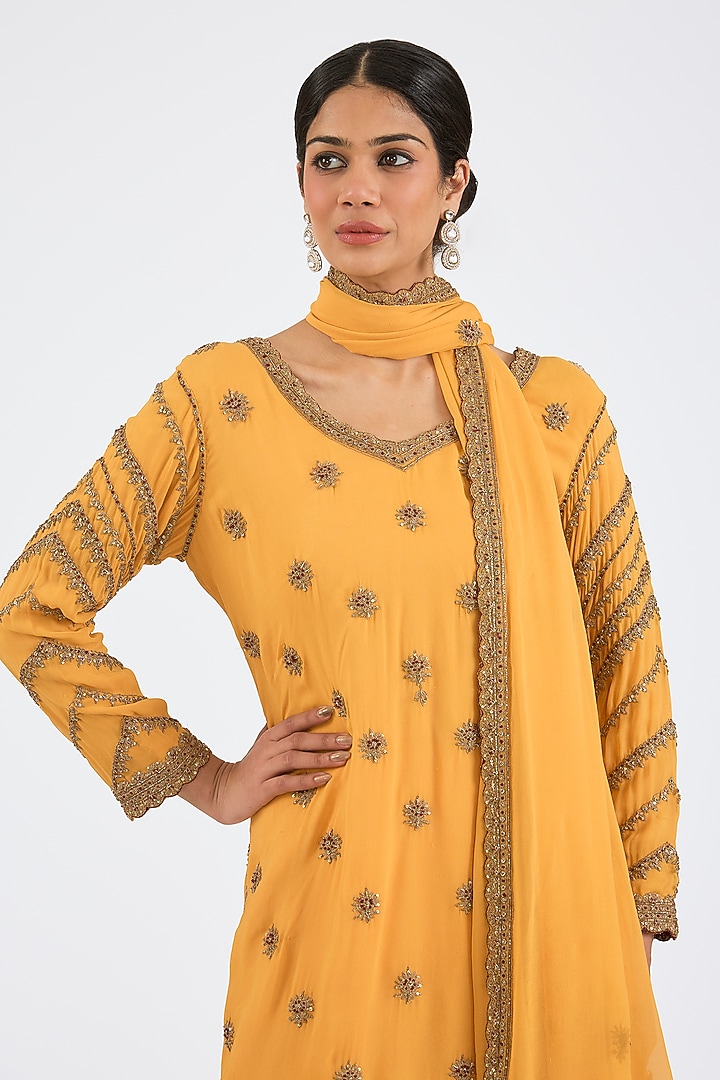 Mustard Yellow Georgette Hand & Machine Embroidered Kurta Set by NITIKA GUJRAL at Pernia's Pop Up Shop