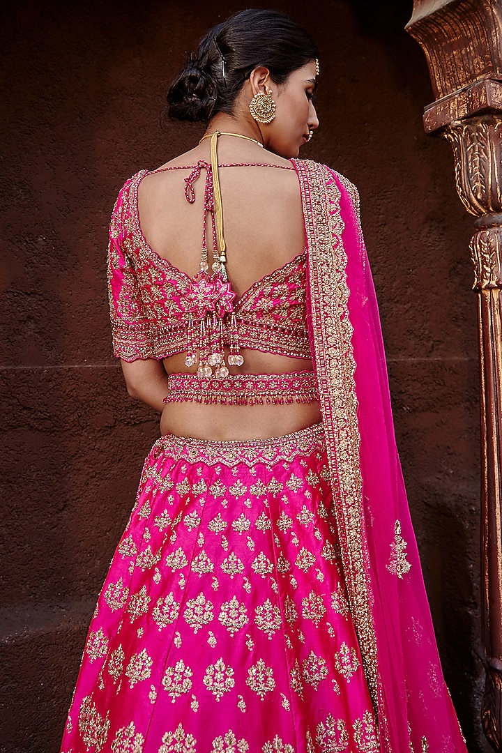 Fuchsia Pink Raw Silk Zari Embroidered Bridal Lehenga Set by NITIKA GUJRAL at Pernia's Pop Up Shop