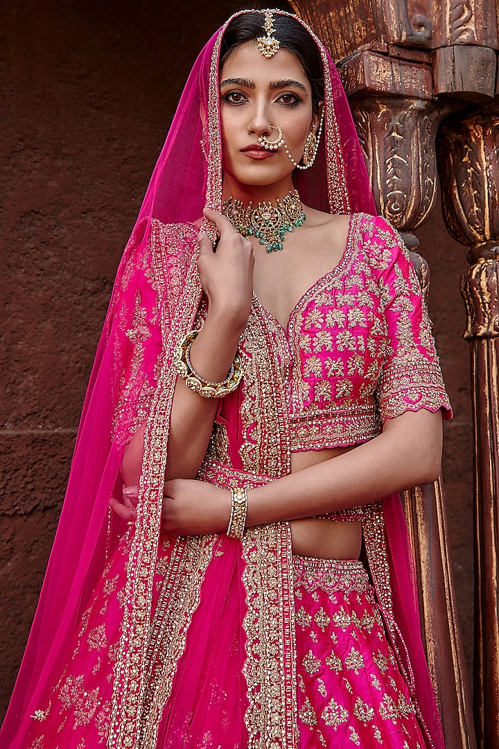 Fuchsia Pink Raw Silk Zari Embroidered Bridal Lehenga Set by NITIKA GUJRAL at Pernia's Pop Up Shop