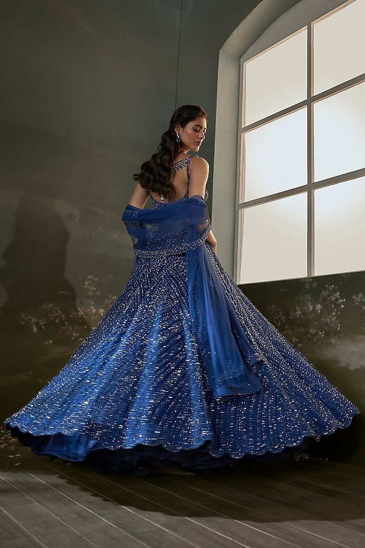 Midnight Blue Net & Satin Sequins Embroidered Bridal Lehenga Set by NITIKA GUJRAL at Pernia's Pop Up Shop
