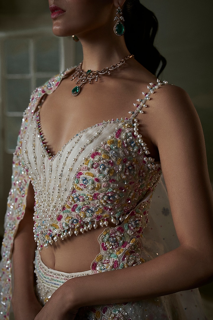 Ivory Organza & Satin Beads Embroidered Bridal Lehenga Set by NITIKA GUJRAL at Pernia's Pop Up Shop