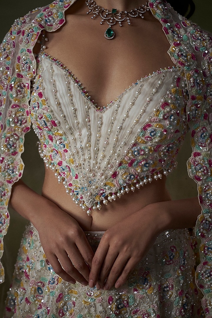 Ivory Organza & Satin Beads Embroidered Bridal Lehenga Set by NITIKA GUJRAL at Pernia's Pop Up Shop