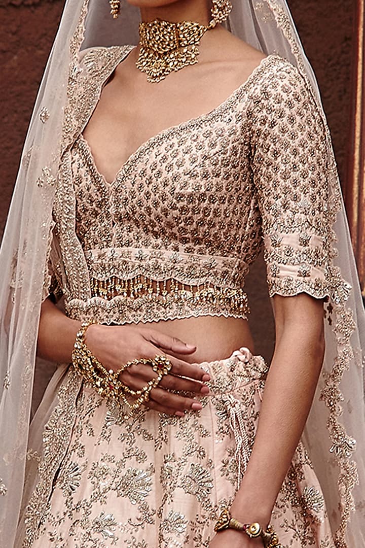 Blush Pink Raw Silk Zari Embroidered Bridal Lehenga Set by NITIKA GUJRAL at Pernia's Pop Up Shop