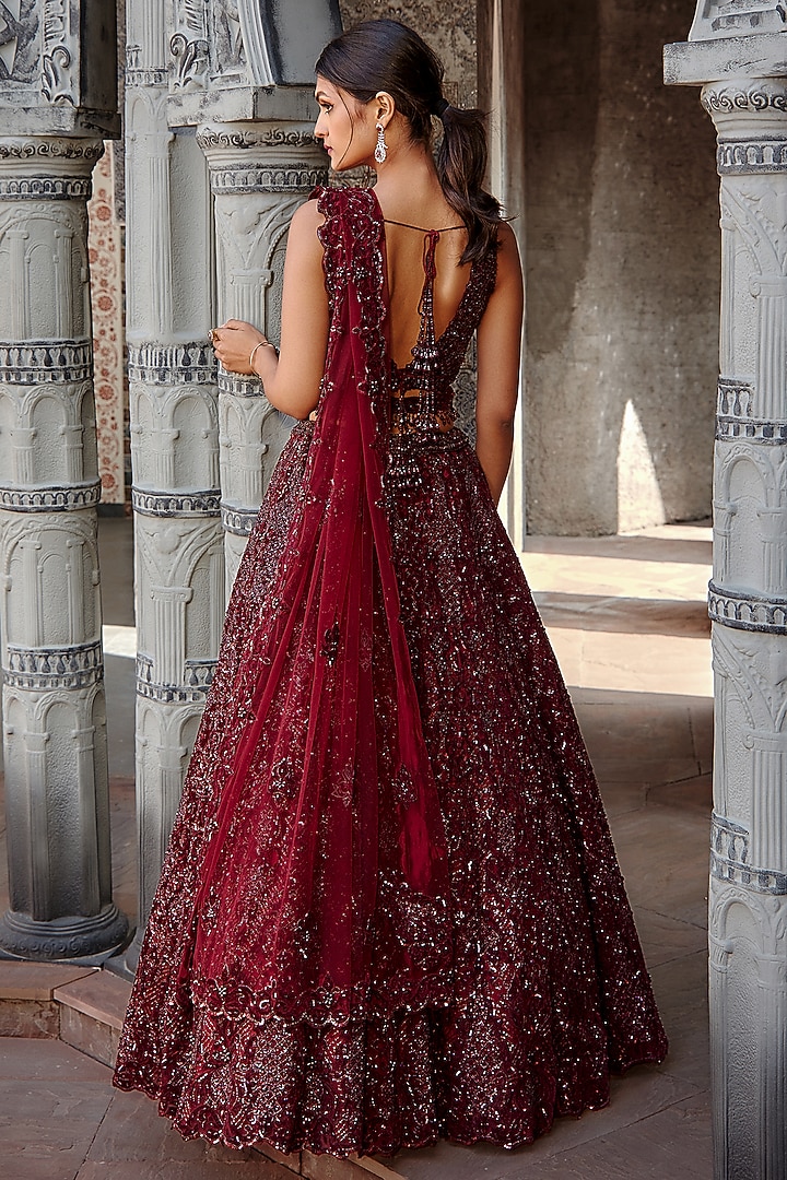 Burgundy Tulle Sequins Embroidered Bridal Lehenga Set by NITIKA GUJRAL at Pernia's Pop Up Shop