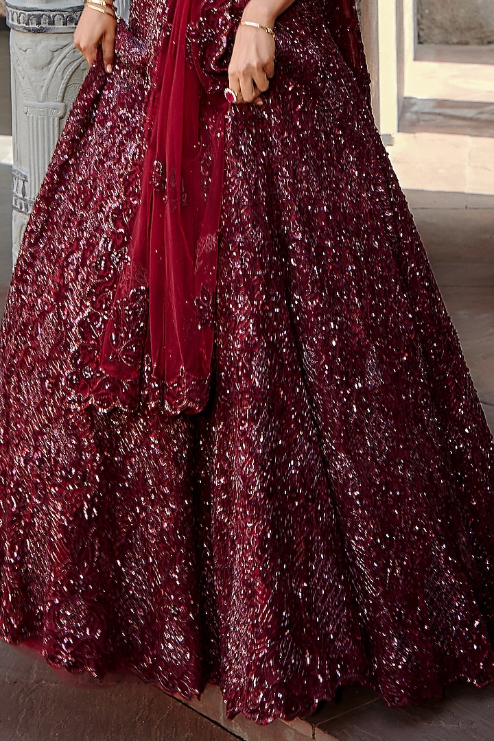 Burgundy Tulle Sequins Embroidered Bridal Lehenga Set by NITIKA GUJRAL at Pernia's Pop Up Shop