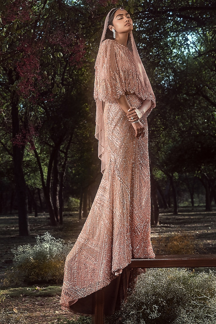 Peach Soft Net Crystal Embroidered Cape Set by NITIKA GUJRAL