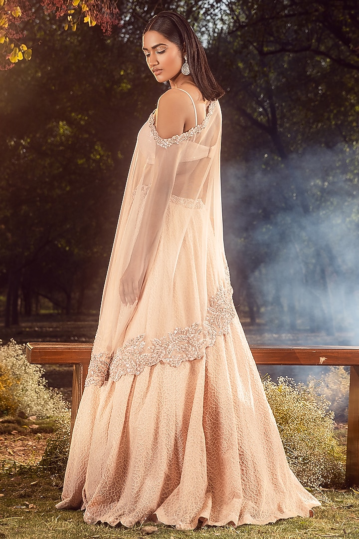 Peach Georgette Sequins Embroidered Wedding Lehenga Set by NITIKA GUJRAL at Pernia's Pop Up Shop