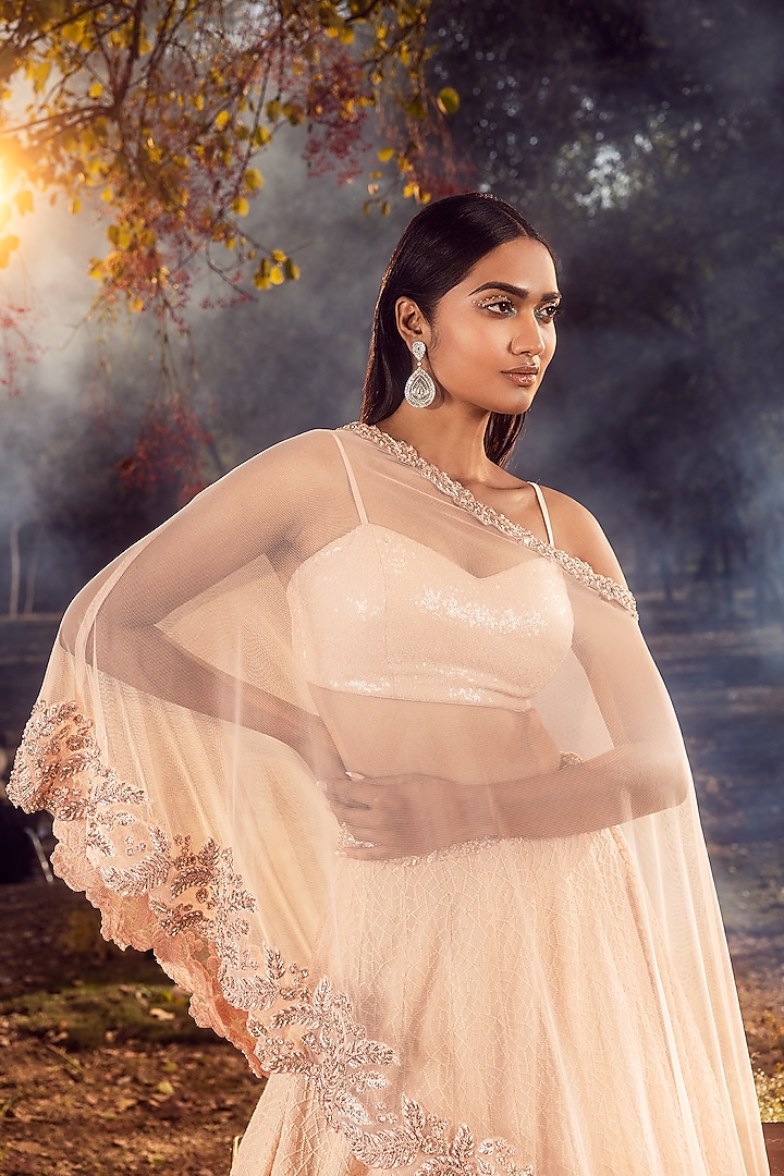 Peach Georgette Sequins Embroidered Wedding Lehenga Set by NITIKA GUJRAL at Pernia's Pop Up Shop