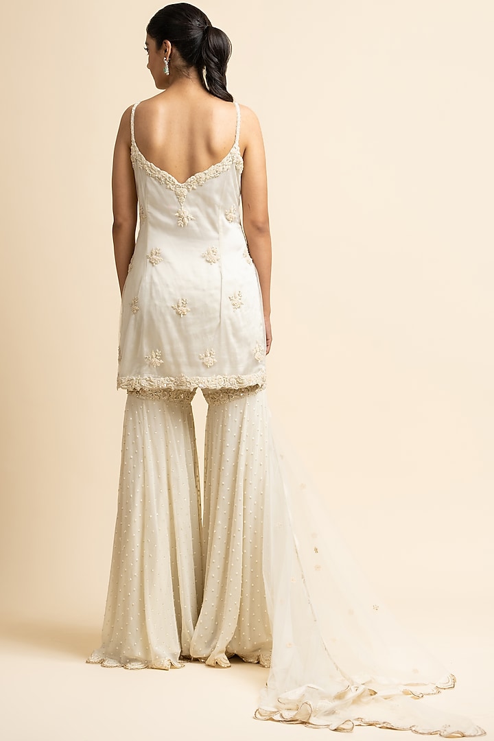 Ivory Georgette Embroidered Gharara Set by NITIKA GUJRAL at Pernia's Pop Up Shop