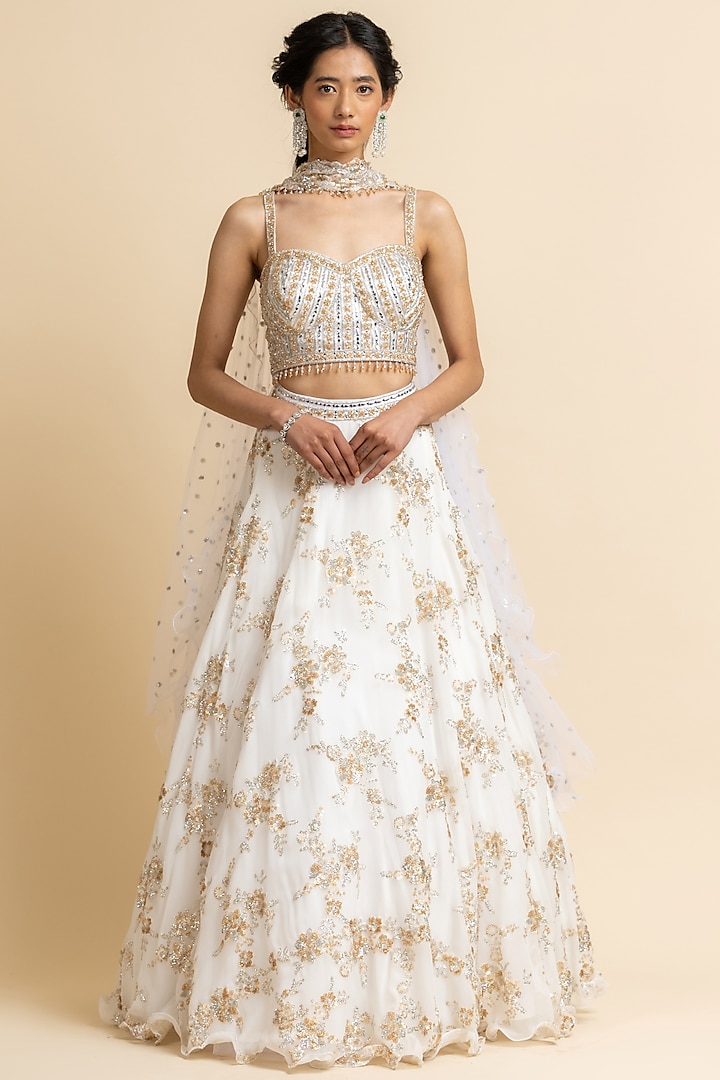 Off-White Net Sequins Embroidered Lehenga Set by NITIKA GUJRAL