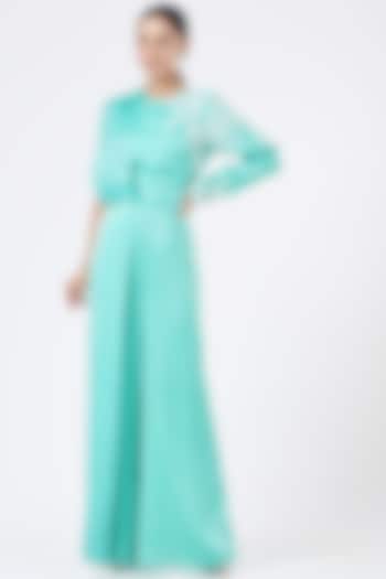 Turquoise Satin Draped Jumpsuit by NITIKA GUJRAL