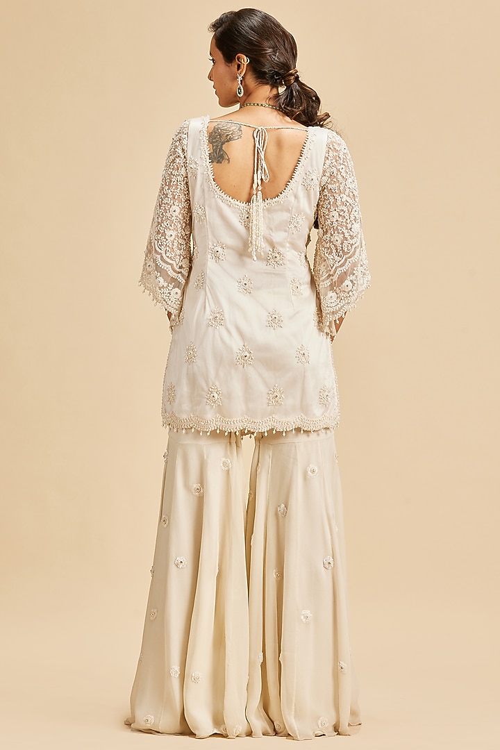 Ivory Shimmer Georgette Embroidered Wedding Sharara Set by NITIKA GUJRAL at Pernia's Pop Up Shop