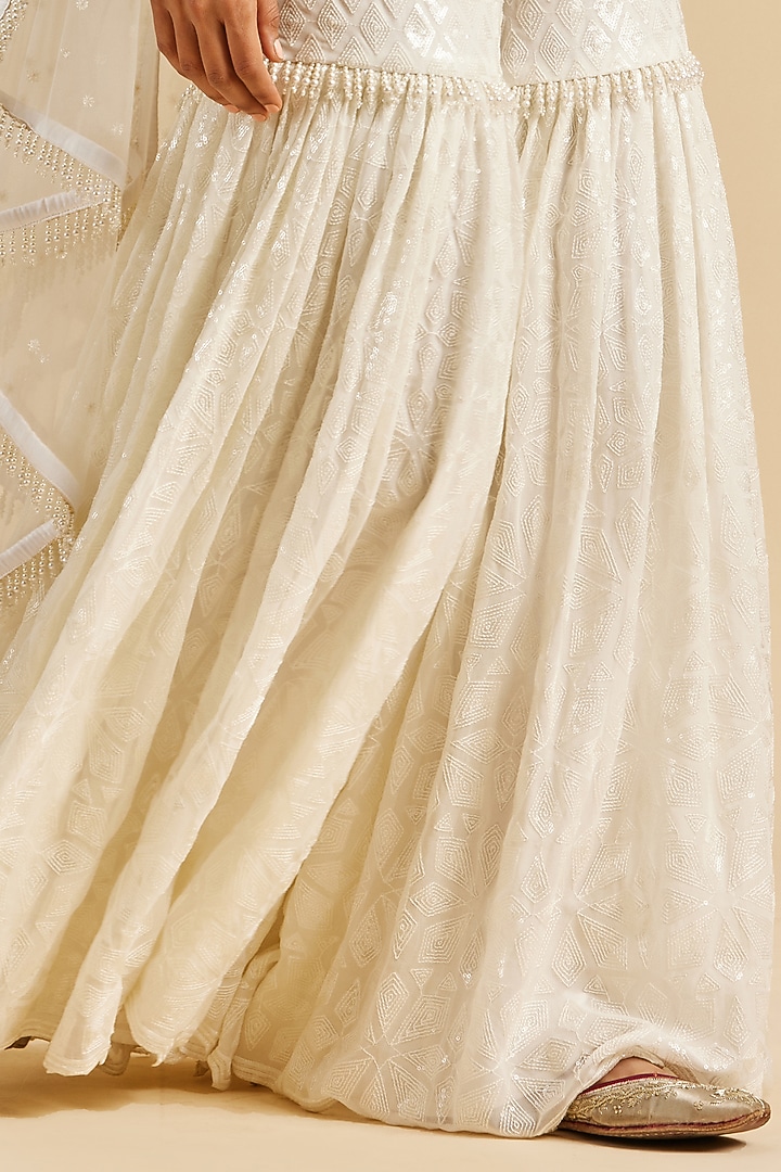 Ivory Georgette Embroidered Gharara Set by NITIKA GUJRAL at Pernia's Pop Up Shop