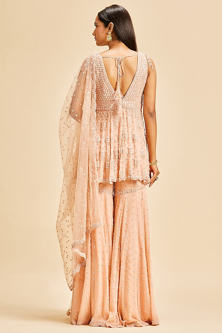 Peach Georgette Gharara Set by NITIKA GUJRAL at Pernia's Pop Up Shop