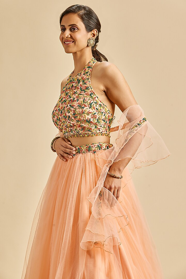 Peach Net Gathered Wedding Lehenga Set by NITIKA GUJRAL at Pernia's Pop Up Shop