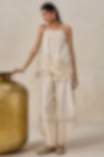 Ivory Chanderi Applique Embroidered Short Kurta Set by NITIKA GUJRAL at Pernia's Pop Up Shop
