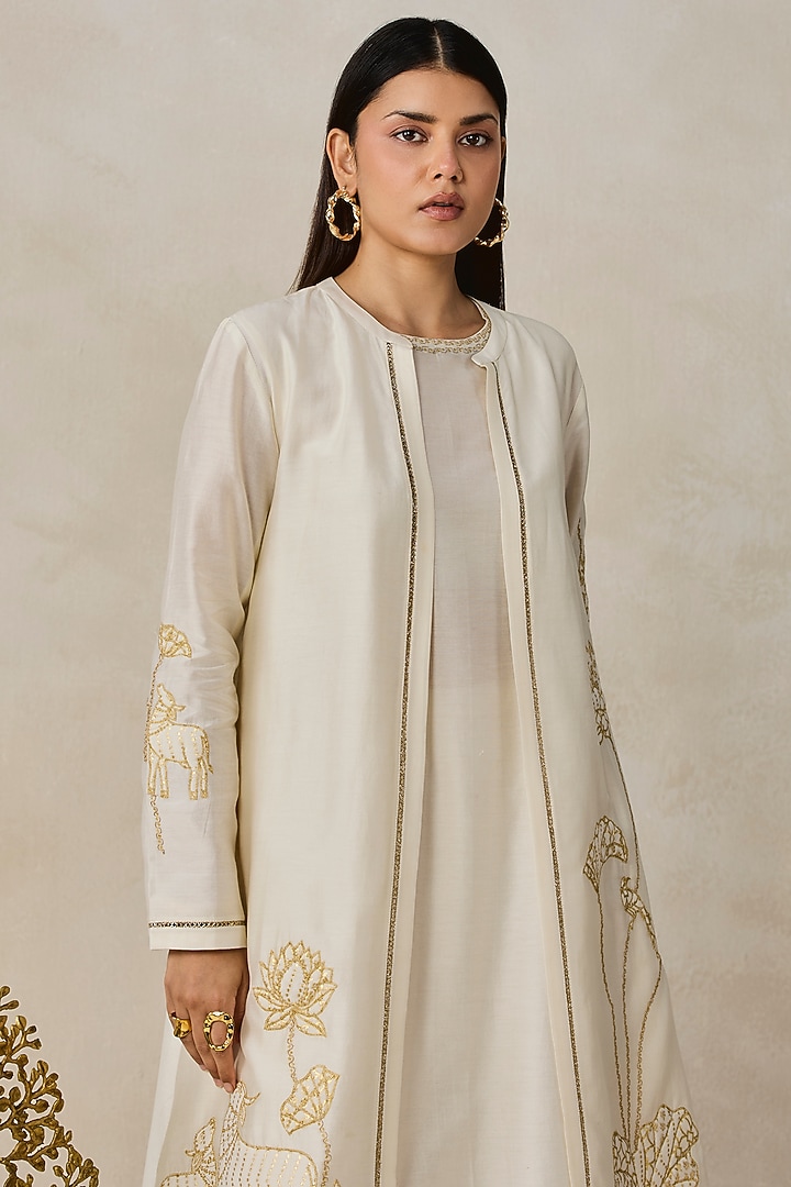 Ivory Chanderi Applique Embroidered Jacket Kurta Set by NITIKA GUJRAL at Pernia's Pop Up Shop