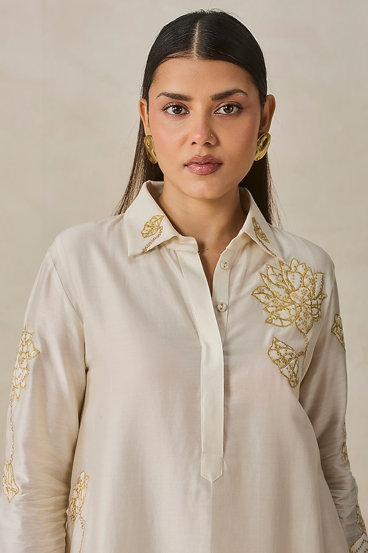 Ivory Chanderi Applique Embroidered Kurta Set by NITIKA GUJRAL at Pernia's Pop Up Shop