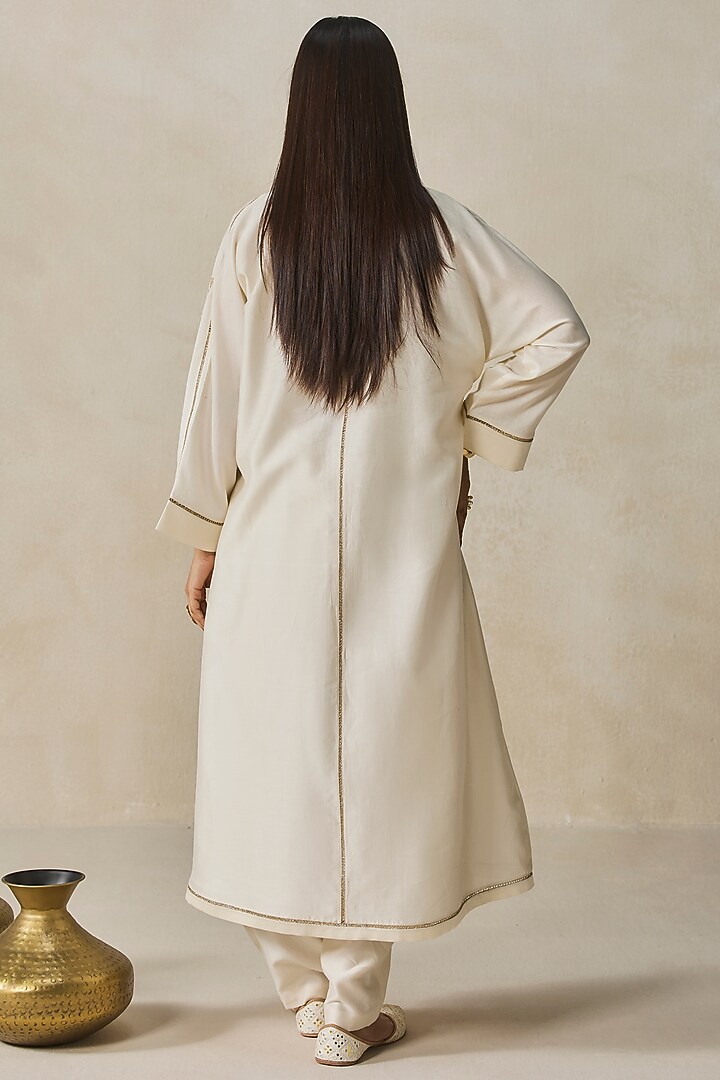 Ivory Chanderi Applique Embroidered Kurta Set by NITIKA GUJRAL at Pernia's Pop Up Shop