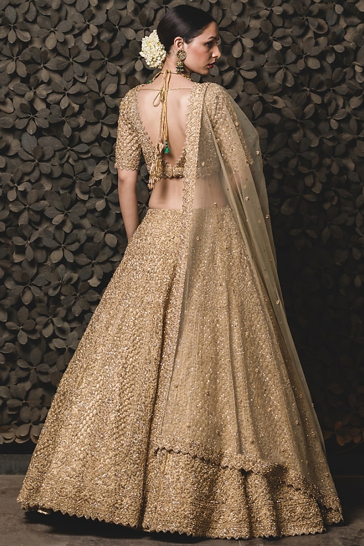 Golden Tulle Crystal Embroidered Bridal Lehenga Set by NITIKA GUJRAL at Pernia's Pop Up Shop