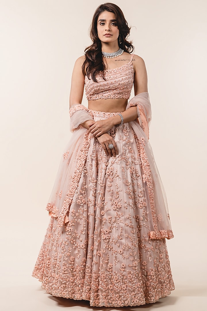 Peach Tulle Sequins Embroidered Bridal Lehenga Set by NITIKA GUJRAL at Pernia's Pop Up Shop