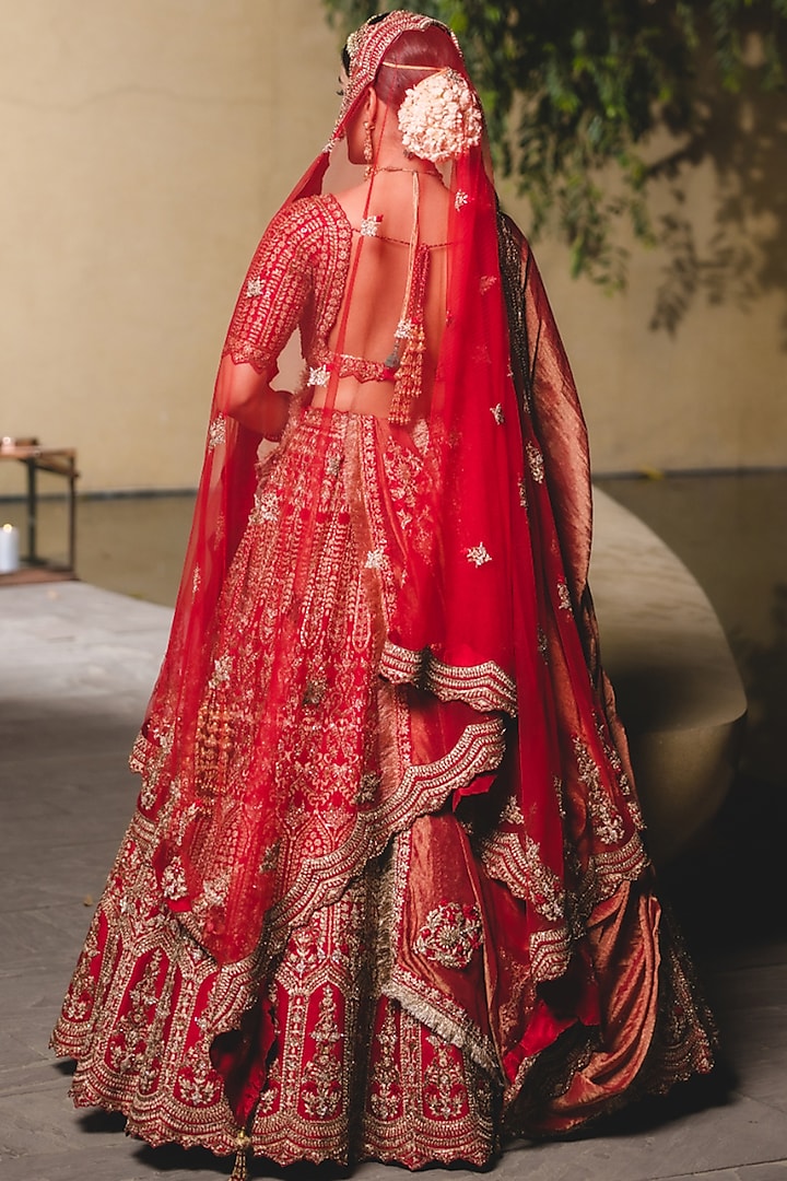 Blood Red Raw Silk Golden Zari Embellished Bridal Lehenga Set by NITIKA GUJRAL at Pernia's Pop Up Shop