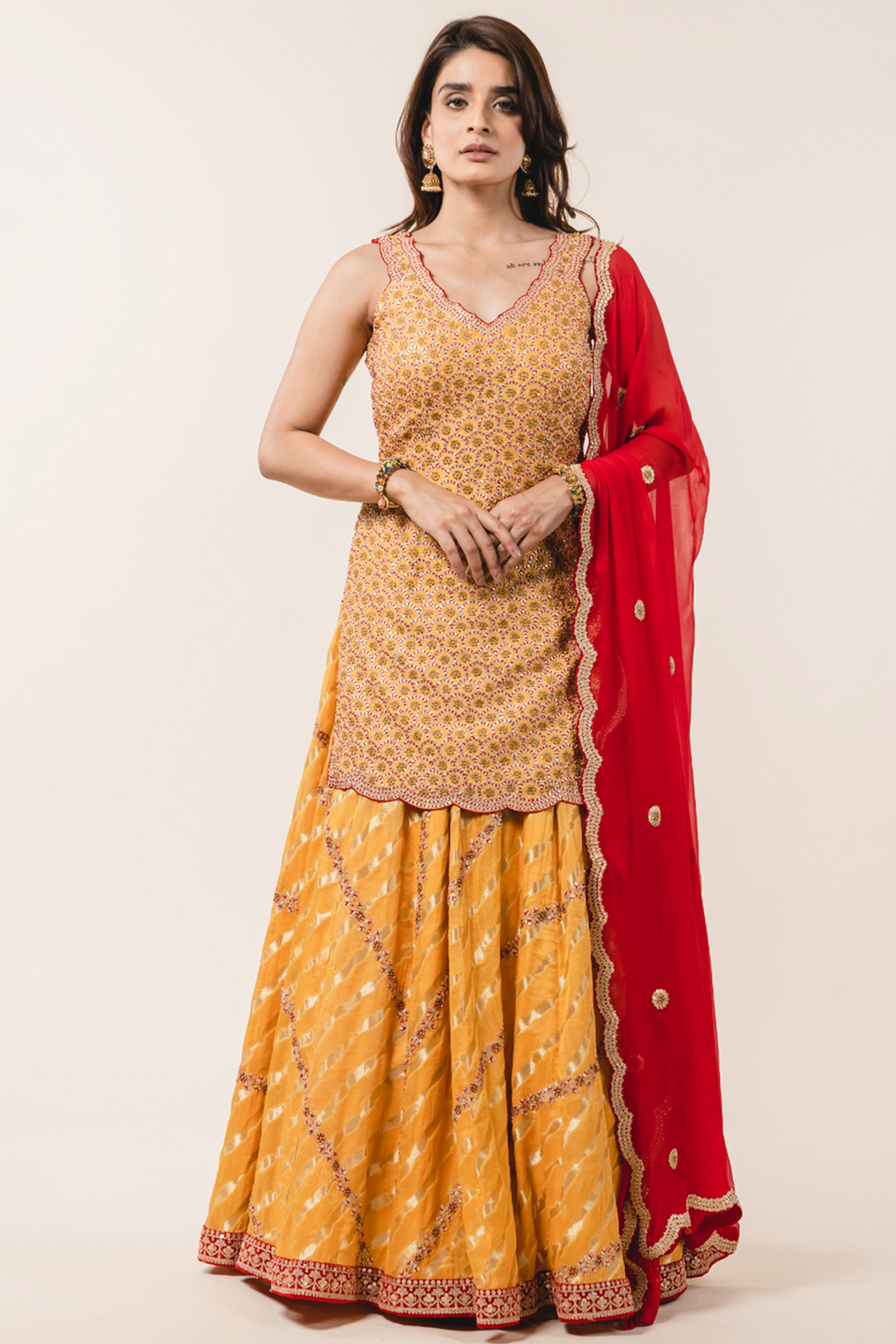 Mustard Georgette Gota Embellished Wedding Lehenga Set by NITIKA GUJRAL at Pernia's Pop Up Shop