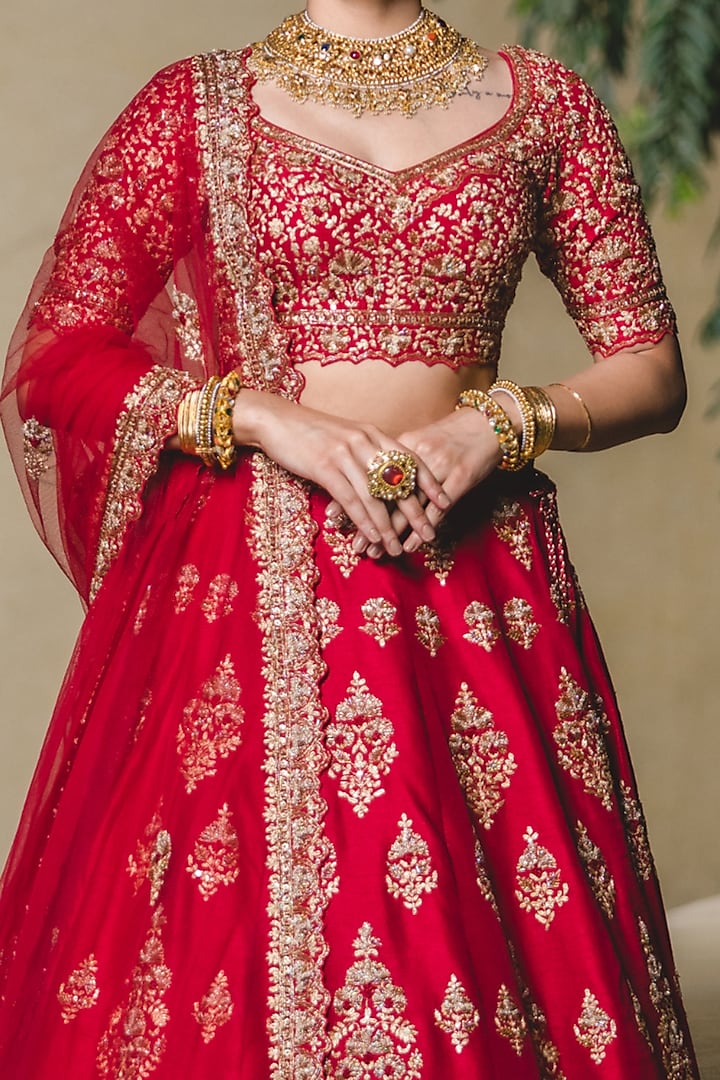 Crimson Raw Silk Gold Zari Embellished Bridal Lehenga Set by NITIKA GUJRAL at Pernia's Pop Up Shop
