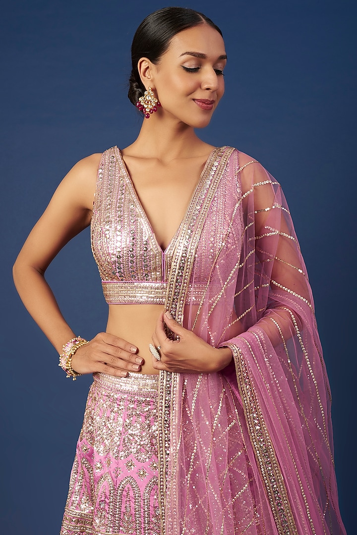 Pink Tulle Sequins Embroidered Bridal Lehenga Set by NITIKA GUJRAL at Pernia's Pop Up Shop