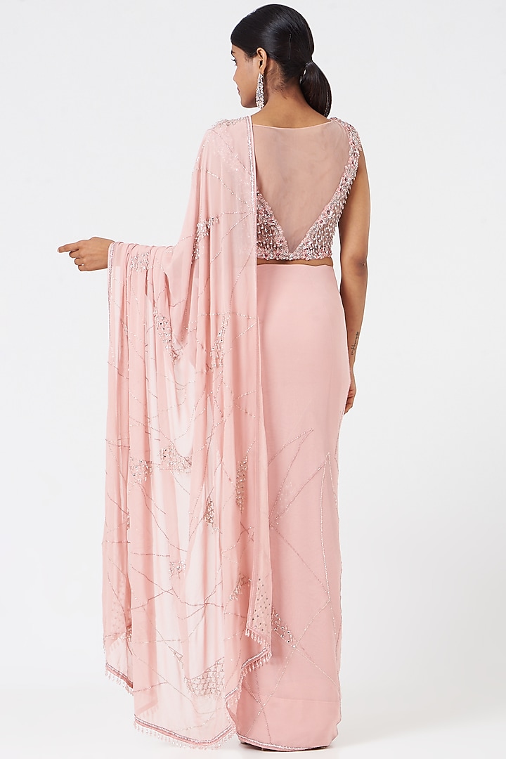 Soft Coral Georgette Sequins Embroidered Reception Saree Set by NITIKA GUJRAL at Pernia's Pop Up Shop