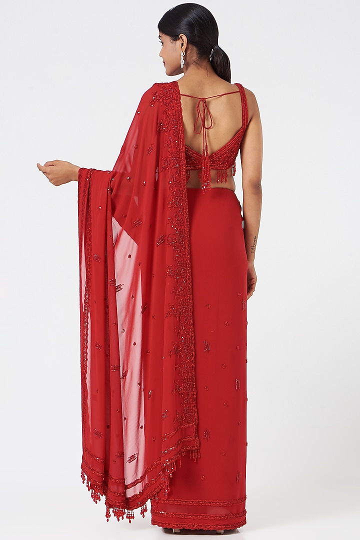 Red Georgette Crystal Embroidered Reception Saree Set by NITIKA GUJRAL at Pernia's Pop Up Shop
