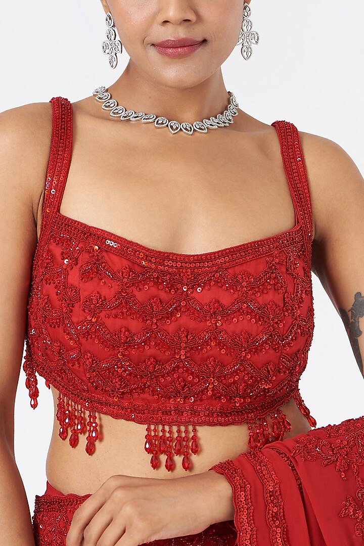 Red Georgette Crystal Embroidered Reception Saree Set by NITIKA GUJRAL at Pernia's Pop Up Shop