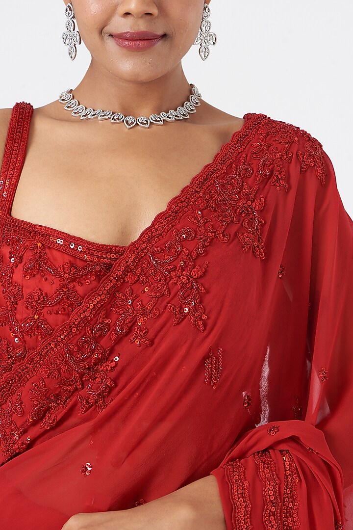 Red Georgette Crystal Embroidered Reception Saree Set by NITIKA GUJRAL at Pernia's Pop Up Shop