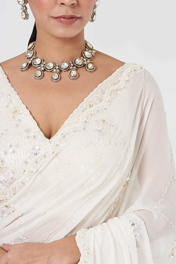 Off-White Georgette Crystal Embroidered Reception Saree Set by NITIKA GUJRAL at Pernia's Pop Up Shop