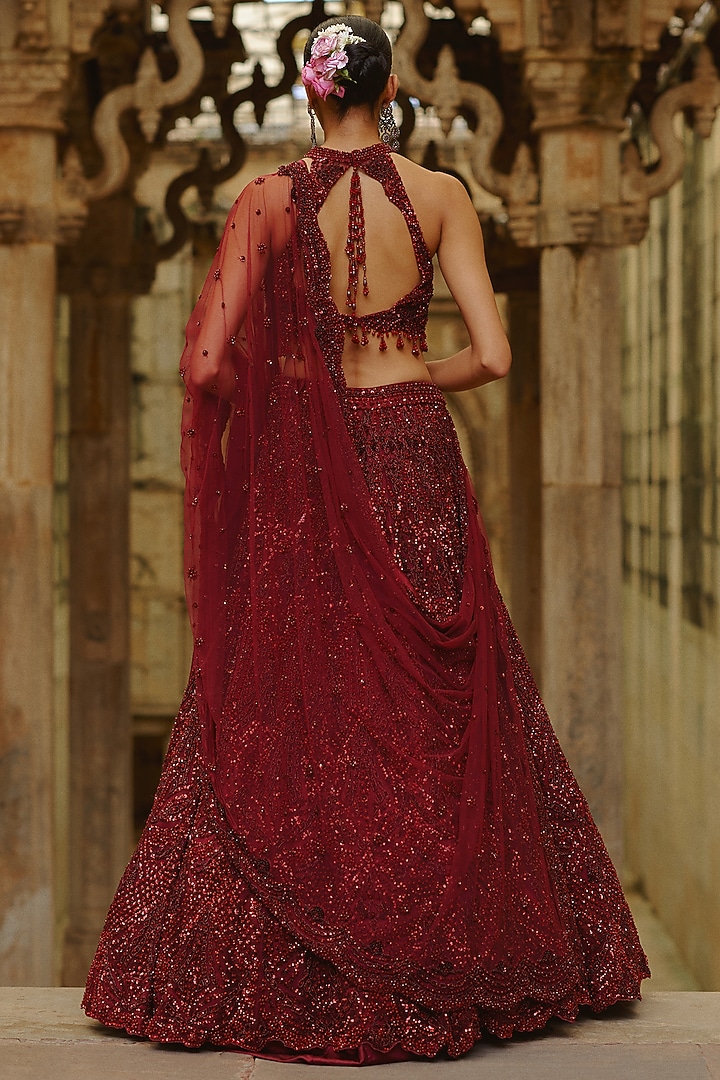 Burgundy Net Bead Embellished Bridal Lehenga Set by NITIKA GUJRAL at Pernia's Pop Up Shop