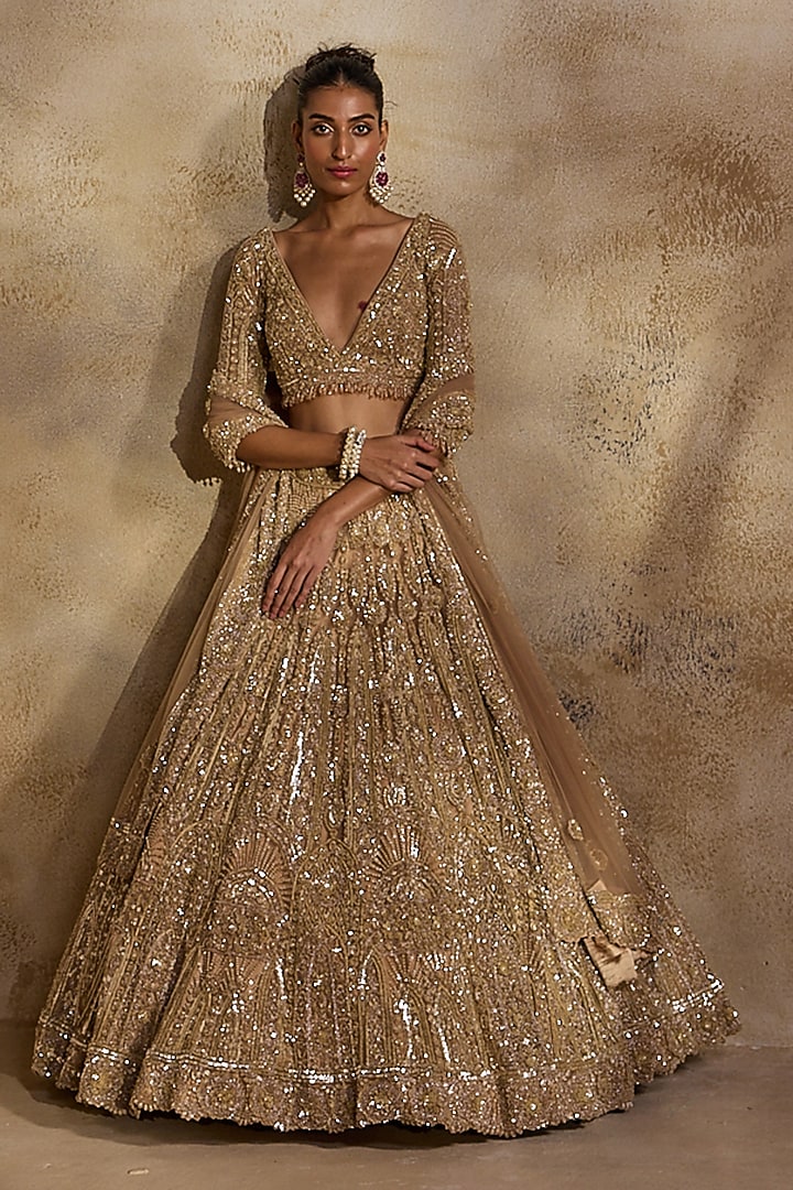 Champagne Gold Tulle Sequins Embroidered Bridal Lehenga Set by NITIKA GUJRAL at Pernia's Pop Up Shop