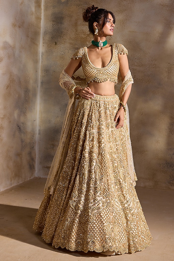 Golden Tulle Beads & Sequins Embroidered Bridal Lehenga Set by NITIKA GUJRAL at Pernia's Pop Up Shop