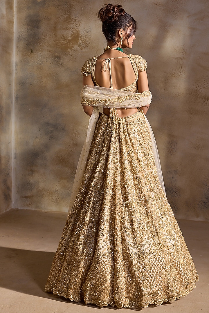Golden Tulle Beads & Sequins Embroidered Bridal Lehenga Set by NITIKA GUJRAL at Pernia's Pop Up Shop