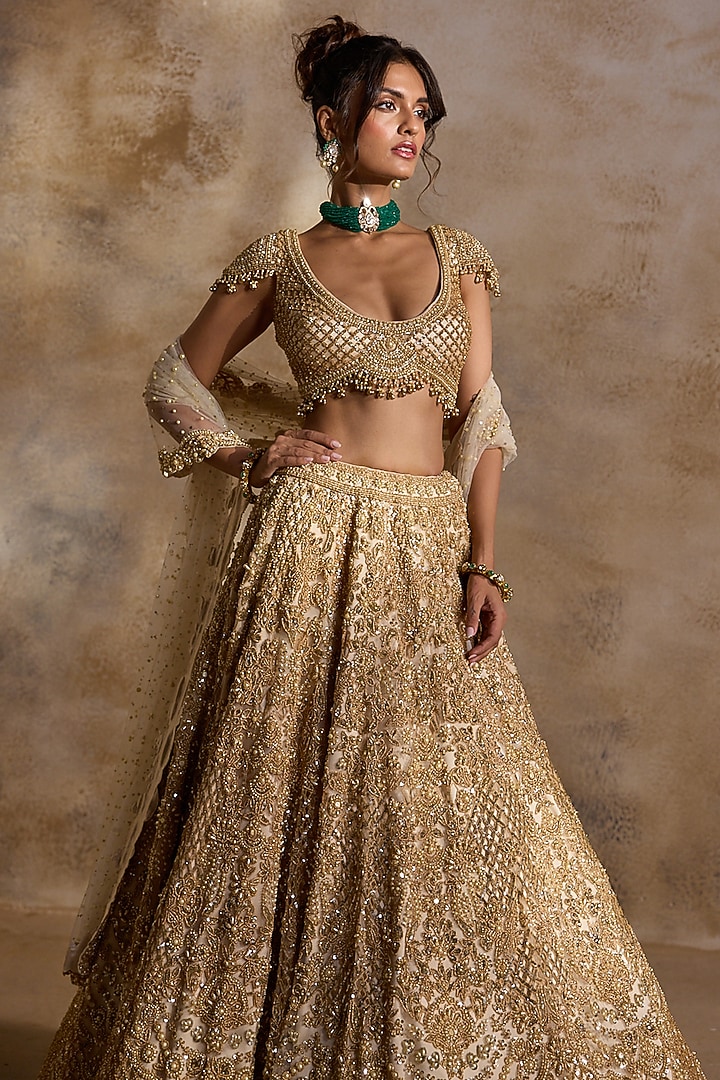 Golden Tulle Beads & Sequins Embroidered Bridal Lehenga Set by NITIKA GUJRAL at Pernia's Pop Up Shop