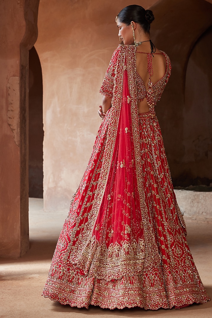 Vibrant Red Raw Silk Dabka Embroidered Bridal Lehenga Set by NITIKA GUJRAL at Pernia's Pop Up Shop