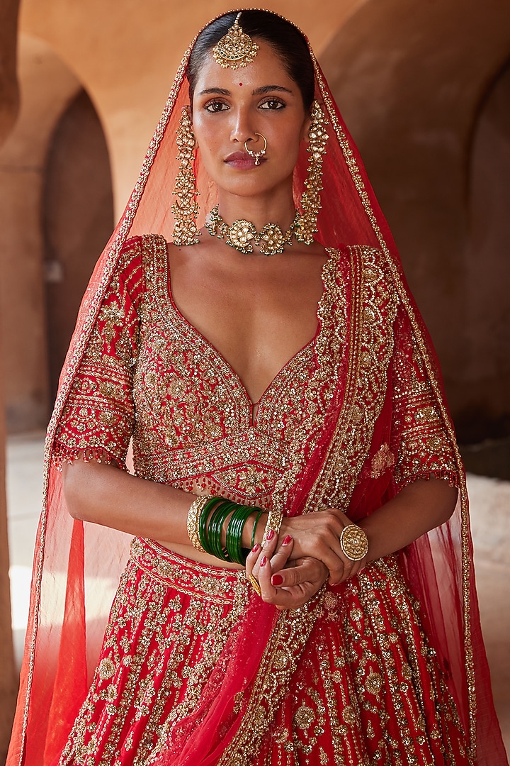 Vibrant Red Raw Silk Dabka Embroidered Bridal Lehenga Set by NITIKA GUJRAL at Pernia's Pop Up Shop