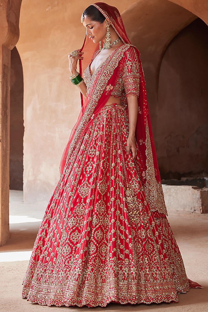 Vibrant Red Raw Silk Dabka Embroidered Bridal Lehenga Set by NITIKA GUJRAL at Pernia's Pop Up Shop