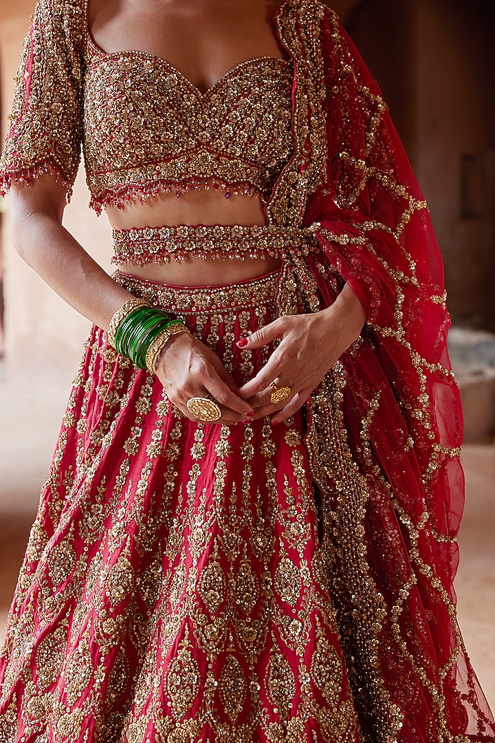 Deep Red Raw Silk Dabka Embroidered Bridal Lehenga Set by NITIKA GUJRAL at Pernia's Pop Up Shop