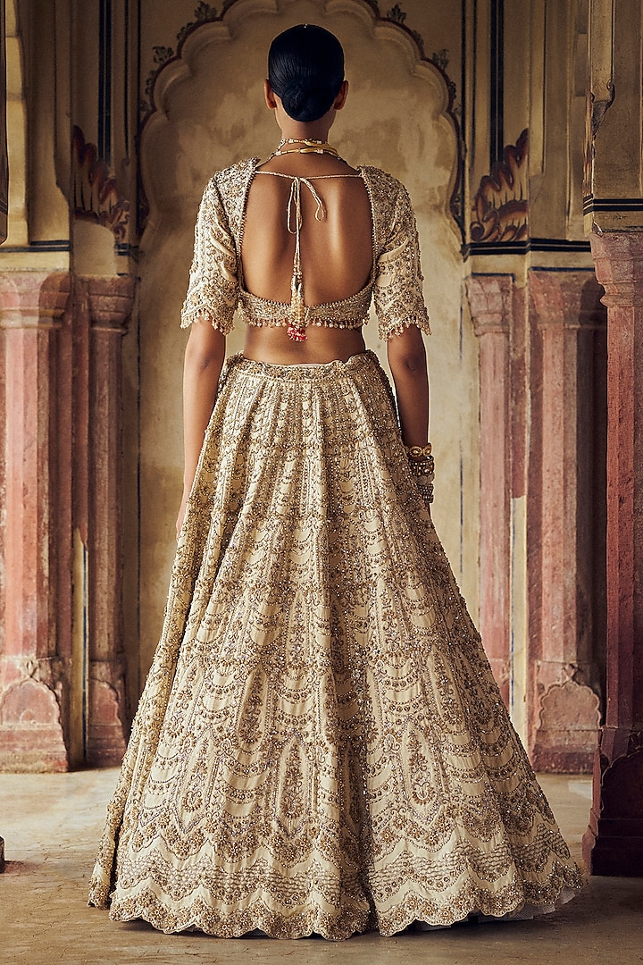Gold Raw Silk Dabka & Sequins Embroidered Bridal Lehenga Set by NITIKA GUJRAL at Pernia's Pop Up Shop