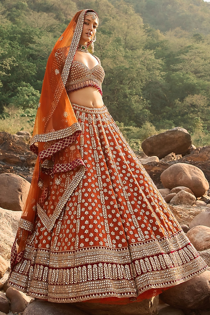 Burnt Orange Raw Silk Zardosi Embroidered Bridal Bridal Lehenga Set by NITIKA GUJRAL at Pernia's Pop Up Shop
