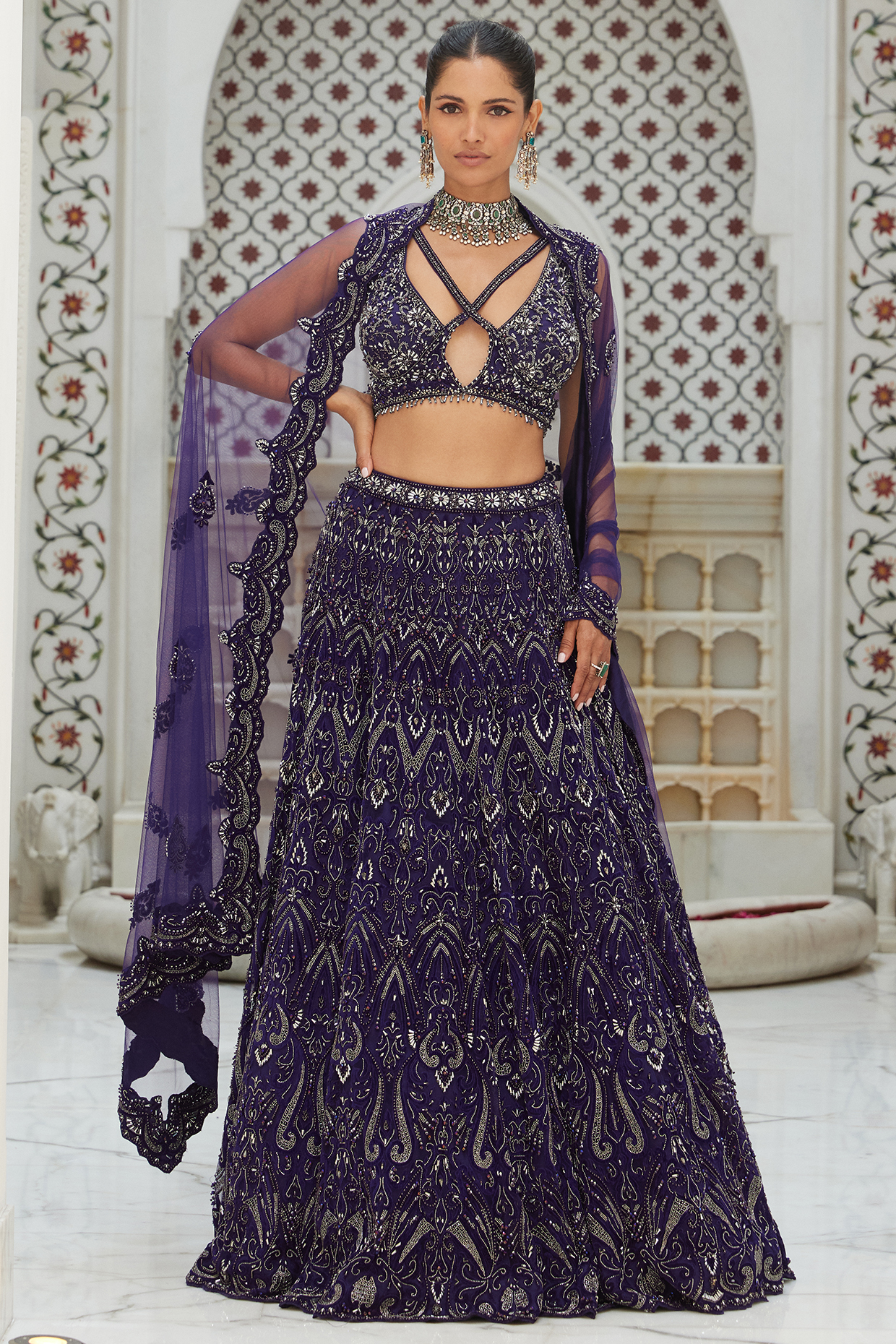 Purple Net Applique Embroidered Bridal Lehenga Set by NITIKA GUJRAL at Pernia's Pop Up Shop