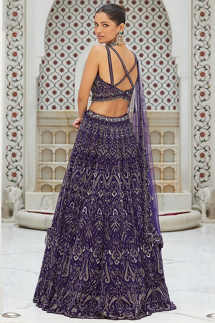 Purple Net Applique Embroidered Bridal Lehenga Set by NITIKA GUJRAL at Pernia's Pop Up Shop
