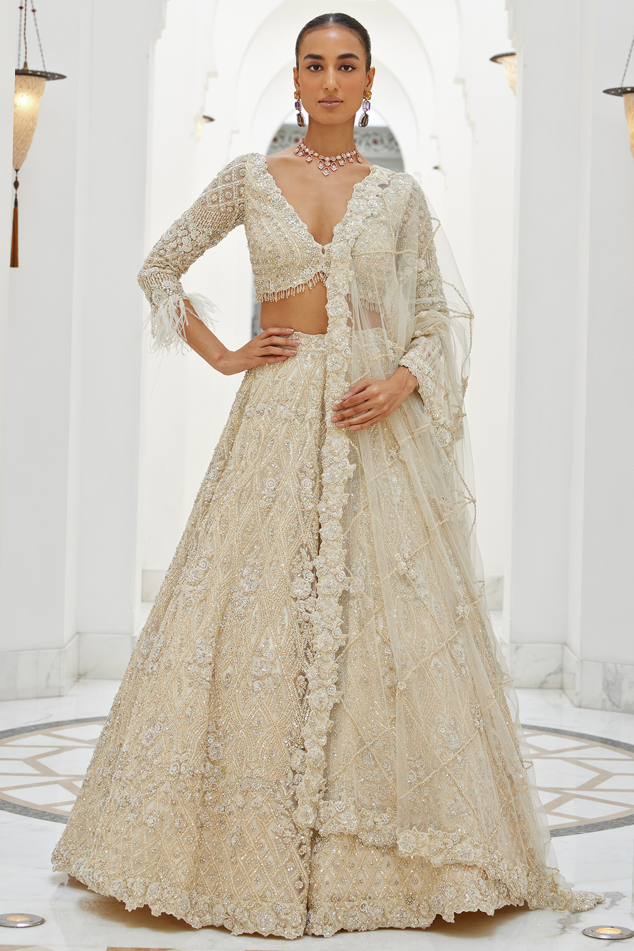 Ivory Net Sequins & Crystal Embroidered Bridal Bridal Lehenga Set by NITIKA GUJRAL at Pernia's Pop Up Shop